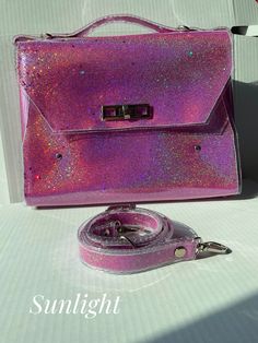 "Pink chunky glitter bag, holographic shiny, jelly vinyl crossbody, magical style, rave vibes, unicorn freak, vegan messenger, alternative The bag will fit a standard size of office paper Colors may vary a bit from screen to screen. For any questions please mail me I'll be happy to help you with informations about available sizes and colors ! I'm open for custom orders! Dimensions:  33 x 23 x 5 cm / 13,2 x 9,2 x 2 inches strap 2 cm( 0,8 inch)  - 110 cm - 43 inch Look at another bags of my projec Iridescent Rectangular Shoulder Bag For Party, Trendy Iridescent Party Bag, Luxury Iridescent Elegant Bags, Trendy Pink Glitter Bags, Trendy Iridescent Bags, Holographic Makeup Bag, Pink Holographic Purse, Holographic Bag, Glitter Bag