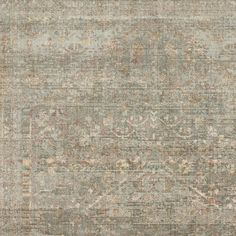 an area rug with many different colors and patterns on the carpet, including grays