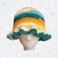 * handmade with acrylic yarn 🧶✨ * made with blue, yellow, and orange colors  and features a wavy brim 💘 * adult sized - measures about 23 inches in circumference Yellow Knitted Crochet Hat For Spring, Yellow Knitted Beach Hat, Yellow Crochet Yarn Cap, Yellow Yarn Crochet Cap, Blue Knitted Beach Hat, Yellow Crochet Cap Hat, Yellow Crochet Hat For The Beach, Yellow Yarn Crochet Hat, Yellow Hand Knitted Beach Hat