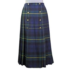 Henry White Dublin wool pleated wrap skirt.  Size 12. 100% wool Green, black and blue tartan plaid Fully lined Eight decorative anchor buttons Button closure Made in the Republic of Ireland Approximate measurements: Waist 30 inches Hips 46 inches Length 34 inches Gorgeous vintage piece to add to your collection! Anchor Decor, Blue Tartan, Athens Ga, Skirt Pleated, Republic Of Ireland, The Republic, Tartan Plaid, Wrap Skirt, Dublin