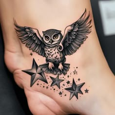 an owl and stars tattoo on the foot