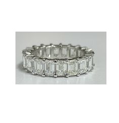 Essential Collection This L Setting Style Emerald Cut Diamond Eternity Band ring is a timeless, elegant and gleaming that goes all the way around is beautifully set on this shared 14k white prong design. We only use Natural stones. This would be suitable for Wedding Bands, Anniversary or even Push Gifts. It's a ring that you can wear in any occasions and goes well with any outfit. Fancy shape eternity bands are more expensive than rounds due to the fact that each stone has to be matched for colo Timeless Diamond White Emerald Cut Eternity Band, Elegant Asscher Cut Eternity Band With Vvs Clarity, Elegant Radiant Cut Diamond Eternity Band, Elegant White Gold Asscher Cut Eternity Band, Timeless Emerald Cut Diamond Eternity Band, Classic White Gold Eternity Band With Radiant Cut, Elegant White Emerald Cut Eternity Band, Classic White Gold Radiant Cut Eternity Band, White Asscher Cut Elegant Eternity Band