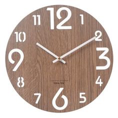 a wooden clock with white numbers on it