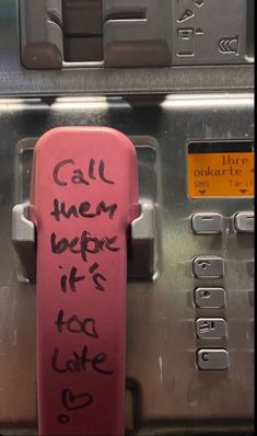 a machine with writing on it that says call them before it's too late