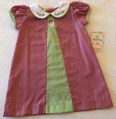 SuCre' by Le' Za Me Red Gingham Santa Dress 24 Months New with Tags SuCre' by Le' Za Me Red and green gingham dress features flower and Santa embroidery and back buttons 55% Cotton, 45% Polyester Measurements - Length is 17 1/2 inches from shoulder to hem Chest is 11 inches across     RETURNS/REFUNDS: If you need to return an item, go to your purchase in eBay, select "return this item" and select the correct reason.  Please note that original shipping costs are non-refundable, unless I misrepres Red Green Outfit, Quirky Fashion Vintage, Red And Green Outfit, Green Gingham Dress, Santa Embroidery, Fruit Fashion, Etsy Clothes, Santa Dress, Brunch Fashion