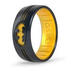 the batman symbol ring is shown in black and yellow