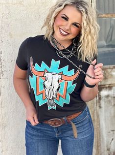 Turquoise and orange aztec with a Western bull skull Ultra soft espresso colored triblend tee Designed by Texas True Threads Fits true to size or size down for a slimmer size Little to no shrinkage upon washing Western Shirt Ideas, Turquoise Tshirt, Bull Graphic, Clothes Graphic, Texas Western, Mustard Cardigan, Western Aztec, Western Tee, Velvet Hoodie