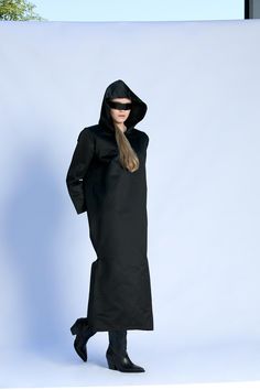 Our hooded black cyberpunk dress has just landed. Made of elegant heavy satin fabric, with big hood, two side zipper slits with big YKK zippers, two side pockets and extra padded shoulders for dramatic look. The perfect gothic dress, witch dress, halloween dress and cyberpunk dress.  🍒 The fabric is heavy satin fabric - Polyester  🍒 Please take a look at our size chart to ensure perfect fit https://www.etsy.com/listing/265083605/ .  🍒 The dress is 51 inches ( 130 cm) long.  🍒  We accept cust Cyberpunk Dress, Witch Dress, Steampunk Dress, Dramatic Look, Gothic Dress, Halloween Dress, Winter Dresses, Hoodie Dress, Satin Fabric