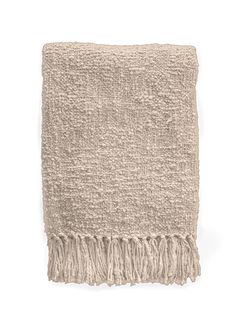 a beige blanket with fringes on it