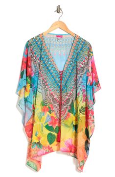 A breezy and lightweight poncho in a blooming floral print brings effortless boho vibes to your wardrobe. 31'' length (O/S) V-neck with lace-up closure Kimono sleeves All-over print Woven 100% polyester Dry clean Imported Model stats: 5'10", 32" bust, 25" waist, 36" hip. Model is wearing size OS. Bento Bag, Bento Bags, Kimono Sleeves, Kimono Sleeve, Boho Vibe, Kimono Top, Floral Print, Floral Prints, Dry Clean