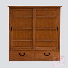 a wooden cabinet with two drawers and handles