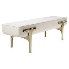 an upholstered bench with two legs and a cushion on the bottom, against a white background