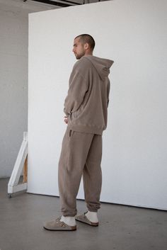 A staple in every wardrobe. The Core Sweatpant is made of 12 oz cotton with a vintage-inspired, baggy silhouette. Includes elasticized hem cuffs, drawstring waistband, and side pockets. Pair it with one of our Core sweatshirts to complete your matching lounge set. 100% ORGANIC COTTON 12 OZ BRUSHED TERRY STANDARD FIT HIGH RISE GARMENT WASHED Oversized Cotton Joggers For Fall, Brown Relaxed Fit Sweatpants For Winter, Oversized Cotton Joggers With Ribbed Cuffs, Winter Brown Relaxed Fit Sweatpants, Cotton Sweatpants With Ribbed Cuffs For Casual Wear, Cotton Sweatpants With Ribbed Cuffs For Elevated Casual Wear, Cotton Tapered Leg Sweats For Fall, Oversized Sweatpants With Pockets And Straight Hem, Oversized Cotton Sweatpants With Straight Hem