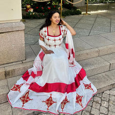 Make a bold and unforgettable statement with our "Ravishing in Red" Habesha Dress, a stunning ensemble that seamlessly combines tradition and contemporary elegance. This gorgeous habesha kemis is handwoven with precision and adorned with intricate embroidery, showcasing the artistry and craftsmanship rooted in Ethiopian heritage. Habesha Dress, Ethiopian Dress, Habesha Kemis, Wedding Dress Chiffon, Dresses Chiffon, Cultural Celebration, Wedding Dresses Simple, Vibrant Red, Simple Dresses