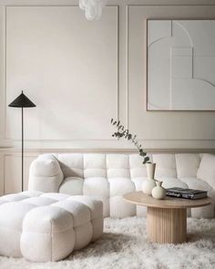 a white couch and table in a room