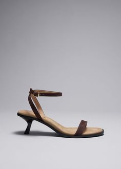 These sandals are crafted from leather and have rounded toes contrasted by geometric curved kitten heels and slim buckle-fastening straps. Finished with comfortably padded insole.Heel height: 5.5cm / 2.2" Leather Kitten Heels With Heel Strap And Open Toe, Leather Open Toe Kitten Heels With Heel Strap, Leather Kitten Heels With Ankle Strap, Medium Width, Leather Ankle Strap Kitten Heels With Heel Loop, Leather Ankle Strap Kitten Heels Medium Width, Leather Kitten Heels With Sculpted Heel And Ankle Strap, Leather Ankle Strap Kitten Heels With Sculpted Heel, Leather Kitten Heels With Ankle Strap, Leather Kitten Heels With Single Toe Strap