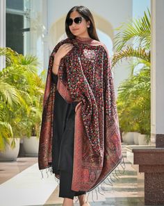 Black Kani dupatta in silk fabric has been meticulously woven into rich & traditional floral motifs and vibrant colour palette to suit all eyes. This gorgeous and rich piece is suitable for any celebration or gathering. Be it a wedding function or a festive celebration, it adds colour and vibrance to your outfit as you team it with salwar suit/ kurta set for an ethnic look or simply don with any modern outfit for that contemporary look. Colour: Black Craft: Kani Weave Fabric: Silk Dimensions:                 L - 2.45 m                 W - 0.95 m Pashmina Silk, Silk Stoles, Bridal Wrap, Fancy Dresses Long, Ethnic Looks, Wedding Wraps, Wedding Function, Silk Shawl, Bridal Shower Gift