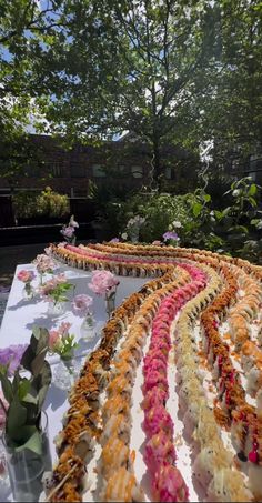 a long table covered in lots of different types of food