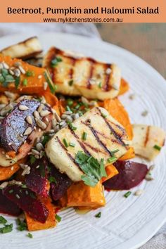 a white plate topped with sliced up vegetables