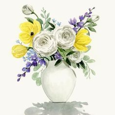 a white vase filled with yellow and purple flowers