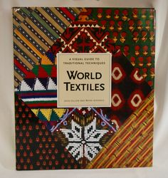 a book about world textiles with an image of the title on it's cover