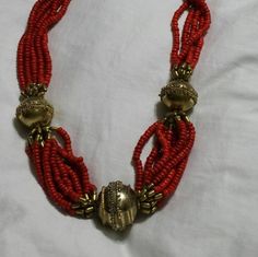 Bright Red Plastic Bead and Ornate Gold Toned Bead, Multi Strand Necklace, Costume Jewelry, Fashion Accessory This is such a nice find.  Very decorative and collectible.  Priced to sell. Check out our shop for monthly specials. We have a variety of items for every taste. Combine several of our items together to save on shipping. If you have any questions please do not hesitate to ask. I will ship outside of the US, just request a quote. Happy Shopping. I will work around the priority mail price. Red Beaded Necklaces For Celebrations And Festivals, Red Beaded Necklace For Festivals And Celebrations, Red Beaded Necklace For Celebrations And Festivals, Festive Round Beaded Costume Jewelry Necklaces, Red Beads For Party And Festivals, Red Beaded Necklaces With Polished Beads For Festivals, Red Beaded Necklace For Festivals With Polished Beads, Red Beaded Necklaces With Gold Beads For Celebration, Red Beaded Necklaces For Celebration