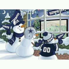 two snowmen wearing hats and scarfs standing in front of a window with a football team on it