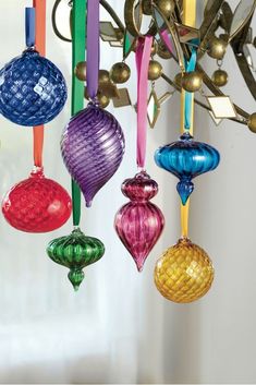 multicolored glass ornaments hanging from a chandelier