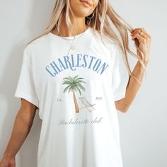 Location could be customized for your desired bachelorette party city/town. Please include location in personalization box. If box is empty, shirt defaults to Charleston P L E A S E   R E A D  before purchasing: D E T A I L S: ~Bella And Canvas 3001 Jersey Short Sleeve Tee~ This comfy, contoured 100% cotton tee offers a semi-fitted silhouette and is pre-shrunk to ensure it stays a staple for longer. It features cap sleeves and a taped neck and shoulders. ✦100% Airlume combed and ringspun cotton Luxury White Short Sleeve Camp Shirt, Beach Bachelorette Party Favors, Luxury Bachelorette, Bachelorette Beach, Charleston Bachelorette, Last Toast On The Coast, Toast On The Coast, Beach Bachelorette Party, Bachelorette Shirt