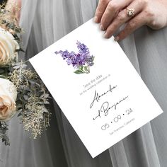 a bride holding a bouquet of flowers and a card with the words always and forever written on it