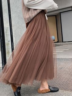 Stretch Solid Color Winter Skirt, Winter Stretch Solid Color Skirt, Winter Stretch Skirt In Solid Color, Non-stretch Skirt For Winter Parties, Winter Party Non-stretch Skirt, Winter Flared Tulle Skirt, Winter Tulle Flared Skirt, Stretch Tulle Skirt For Fall, Winter Party Maxi Skirt