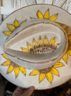 Sunflowers Hand Burned and Painted on Either an Off-white or Light Beige Suede Cowboy Hat. Silver Plated With Little Teal on Hat Band. - Etsy Hand Painted Western Hat Bands For Festival, Artisan Hand Painted Adjustable Hat Bands, Hand Painted Western Hat Bands For Rodeo, Western Style Hand Painted Hat Bands For Country Events, Hand Painted Adjustable Hat Bands For Rodeo, Hand Painted Adjustable Hat Band For Rodeo, Adjustable Hand Painted Hat Band For Rodeo, Country Style Hand Painted Festival Hats, Hand Painted Short Brim Hat For Western-themed Events