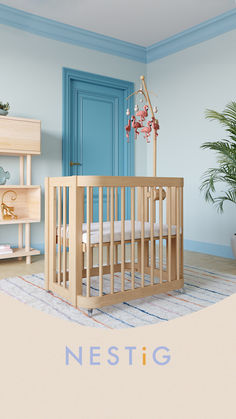 a baby's room with a blue door and wooden crib