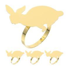 an image of a ring with three dolphins on the front and one dolphin on the back