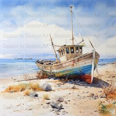 an old boat sitting on top of a sandy beach