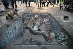 a man falling down some stairs in the middle of a street with other people around him