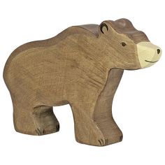 a wooden toy bear is shown on a white background