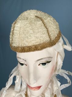 Vintage Women's Hat 1910-1915, Europe. Its style is coarse, "stocking". The hat was worn tight on the head and repeated the shape of the head. Beautiful hat!  The wife of Nicholas II, Alexandra Feodorovna, wore the same.  Mesh embroidery. White and gold glass beads.  In good condition, the beads do not fade. Fitted Cream Hat Bands, Fitted Flapper Cloche Hat With Curved Brim, Fitted Flapper Cloche Hat, Vintage Adjustable Bonnet For Winter, Fitted Cap Style Mini Hat For Costumes, Cream Bonnet Cap One Size, Vintage Adjustable Winter Bonnet, Cream Colored One Size Bonnet Cap, Cream One-size Bonnet Cap