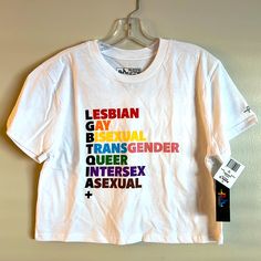 Lgbtqia+ Lesbian Gay Bisexual Transgender Queer Intersex Asexual Tee * Phluid Project Pride Collection * Rainbow * Unisex Cropped T-Shirt * Women’s Cut * Short Sleeve * Size Medium * 100% Cotton White With Black Red Orange Yellow Green Purple Brown Pink And Blue Lettering. Nwt - New And Unworn. Mailed From A Smoke-Free & Pet-Free Home Office. Bundle Items To Save On Shipping! Phluid Project Tag Reads: “The Phluid Project Exists To Empower Individuals The Freedom To Be Who They Want To Be, To Exp Pride Collection, Red Orange Yellow, Cropped T Shirt, T Shirt Women, Shirt Women, Orange Yellow, Green And Purple, Black Red, Colorful Shirts