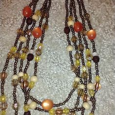 Gorgeous Excellent Condition Handmade Orange Multi-strand Necklace, Orange Beaded Necklace With Dangling Round Beads, Brown Multi-strand Jewelry With Colorful Beads, Brown Multi-strand Necklace With Colorful Beads, Orange Dangling Beads For Jewelry Making, Handmade Brown Beaded Necklaces For Costume Jewelry, Handmade Brown Beaded Necklace Costume Jewelry, Handmade Brown Beaded Costume Jewelry Necklace, Brown Beaded Necklaces