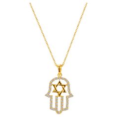 Beautiful Little Hamsa Hand Pendant is made of 14k solid gold. Available in three colors of gold, White Gold / Rose Gold / Yellow Gold. This necklace adorned with natural white round cut pave set diamonds. Perfect for wearing by itself for a minimal everyday style or layered with other pieces for a modern on trend look. "ALL OUR ITEMS ARE ELIGIBLE FOR FREE SHIPPING AROUND THE WORLD" "AVAILABLE IN WHITE GOLD, YELLOW GOLD, ROSE GOLD COLOR" "THIS ITEM IS LISTED AS 14K GOLD IN THIS LISTING, PLEASE W Star Of David Necklace, 1st Dibs, Hand Pendant, Necklace Star, Gold Hamsa, Hand Necklace, Hamsa Hand, Star Of David, Rose Gold Color