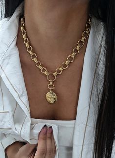 ♦ Hoops links necklace, made of gold 24 K plated brass in very high quality with a Eagle coin pendant,     A  beautiful necklace is full of presence and suitable for any occasion.    ◾  SIZA:  length 13.8" (35 cm) up to 19.8inch ( 50 cm)             wide chain 0.47"  (1.2 cm)             Pendant width: 1.18" (3cm) ◾  Eagle Necklace - Gold Coin Necklace, Chunky Gold Necklace, Circle Link Necklace, Statement Chunky Necklace, medallion Necklace gift for her ♦ This piece of jewelry is perfect as a g Gold-tone Medallion Chain Necklace, Medallion Necklace With Gold Chain, Metal Medallion Necklace With Gold Chain, Handmade Gold Plated Round Pendant Necklace, Handmade Gold Plated Chain Necklace With Round Pendant, Elegant Necklace With Chunky Chain And Medallion, Elegant Medallion Necklace With Chunky Chain, Gift Chunky Chain Necklace With Round Pendant, Gold Brass Pendant Toggle Necklace