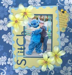 a scrapbook page with an image of a person hugging a blue and yellow stuffed animal