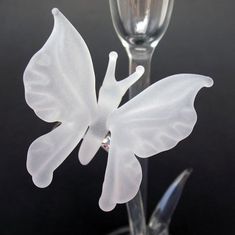 Butterfly Wedding Taper Candle Holder Glass CrystalArtist: Kevin Prochaska, glass blower at Disneyland for more than 10 years                            Material: Borosilicate Crystal and Sand Etched Borosilicate CrystalDimensions: Height 9 inches, Base Dia. 3.5 inches Weight: 6 oz. Suggested Retail: $220.00This exquisite butterfly candle holder will complete the perfect table setting. Styled to uniquely complement the design of my Butterfly Wedding Cake Topper and Toasting Glasses, this beautif Wedding Candle Holders, Taper Candles Wedding, Butterfly Wedding Cake, Butterfly Candle, Butterfly Candle Holder, Unity Candle Holder, My Butterfly, Shabbat Candles, Toasting Glasses