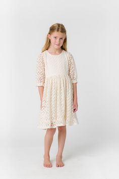 All over lace girl's dress 1/2 length sleeves Round neckline Gathered waist Button back closure Fabric content - Cotton - Dry clean only Modest Lace Dress, Getaway Dress, Called To Surf, Girls Lace Dress, Occasion Dresses Wedding, Wedding Beauty, Button Dress, Cream Dress, Wedding Bridesmaids