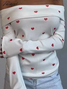 42033772265519|42033772298287|42033772331055 White Heart-shaped Sweater For Spring, White Long Sleeve Sweater For Valentine's Day, White Sweater For Valentine's Day, White Long Sleeve Top With Heart Print, White Long Sleeve Tops With Heart Print, White Long Sleeve Party Sweater, White Spring Party Sweater, Fitted Winter Top With Heart Print, Winter White Tops With Heart Print