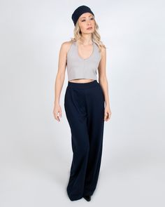 These are the ultimate wide leg palazzo pant. They are high-waisted and have pockets for optimum comfort and style. They look sleek for a business meeting, super cool at the studio, and really hot for a night out. PRODUCT DETAILS: - 60% Rayon, 33% Nylon, 7% Lycra- Moisture wicking and four-way stretch - Machine washable and dryer safe - MADE IN USA - Model: Talia is 5'4" is wearing a size Small View our shipping and returns policy We'd love to hear from you! Email hello@paridaez.com with any que Convertible Clothing, Palazzo Pant, Wide Leg Palazzo Pants, Business Meeting, Palazzo Pants, Super Cool, Dress Pants, The Studio, Evening Wear