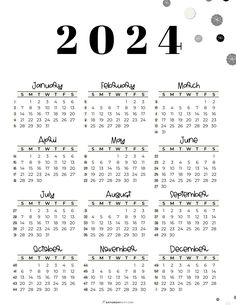 a calendar for the year 2012 with black and white dots on it, in front of a