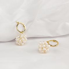 Say hello to our "Maisie" cluster pearl dangle earrings.  These dainty, French vintage style inspired pearl earrings comes with an easy, click-style, latch back, mini huggie hoops, made with real 925 sterling silver coated with a layer of 18k GOLD.  Dangling to the hoops are genuine freshwater small baroque cluster pearls, held together with clear wiring and features gold plated sterling silver hoop connector.  Simply take the attachment off to wear the mini gold hoops on its own, or place the c Delicate Drop Huggie Earrings For Wedding, Elegant Pearl Charm Huggie Earrings For Wedding, Delicate Huggie Earrings For Wedding, Elegant Wedding Huggie Earrings With Pearl Charm, Delicate Small Hoop Huggie Earrings For Wedding, Handmade Dainty Hoop Earrings For Wedding, Dainty Handmade Hoop Earrings For Wedding, Pearl Charm Dangle Hoop Earrings For Party, Gold Pearl Huggie Earrings For Wedding