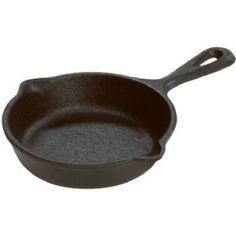 an empty cast iron skillet on a white background